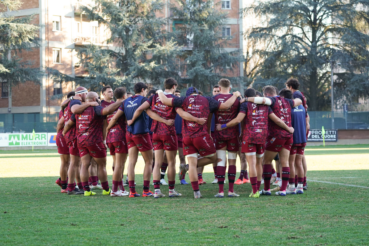 Squadra in cerchio prima della partita